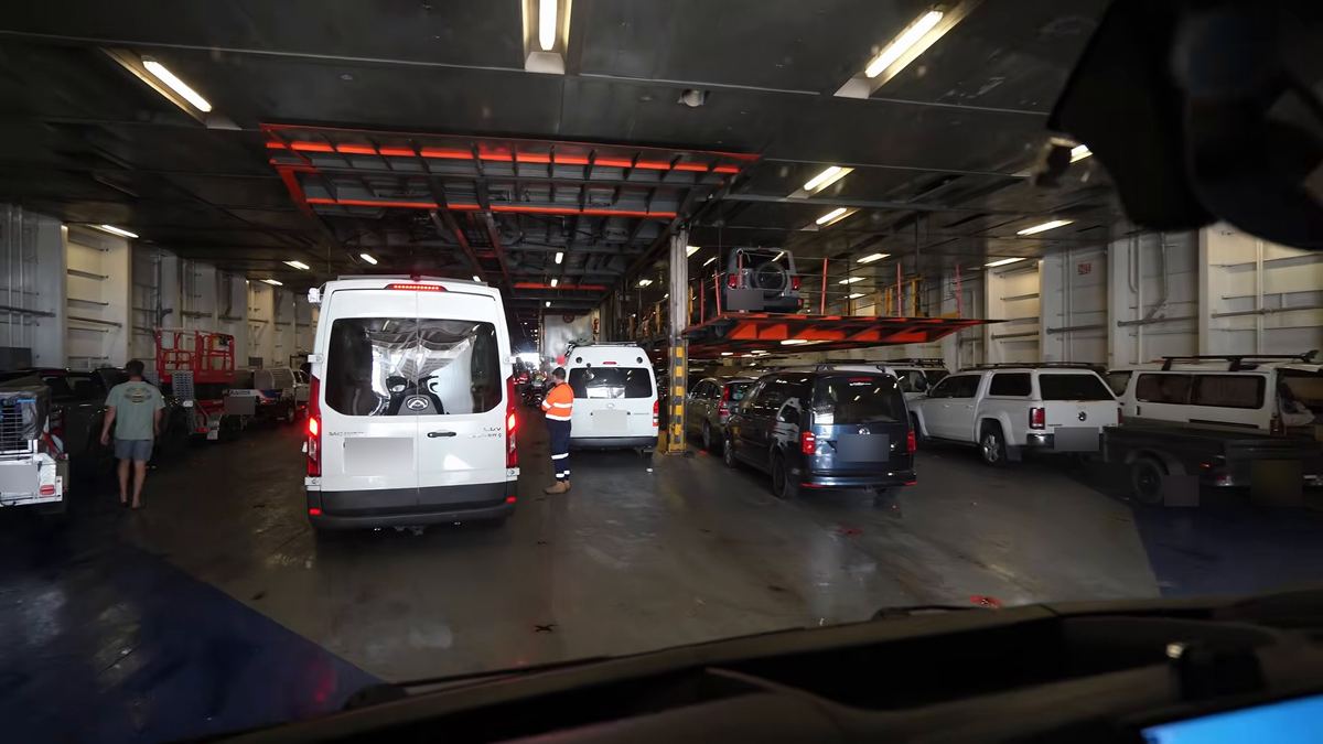 Vans and cars lined up on the vehicle deck
