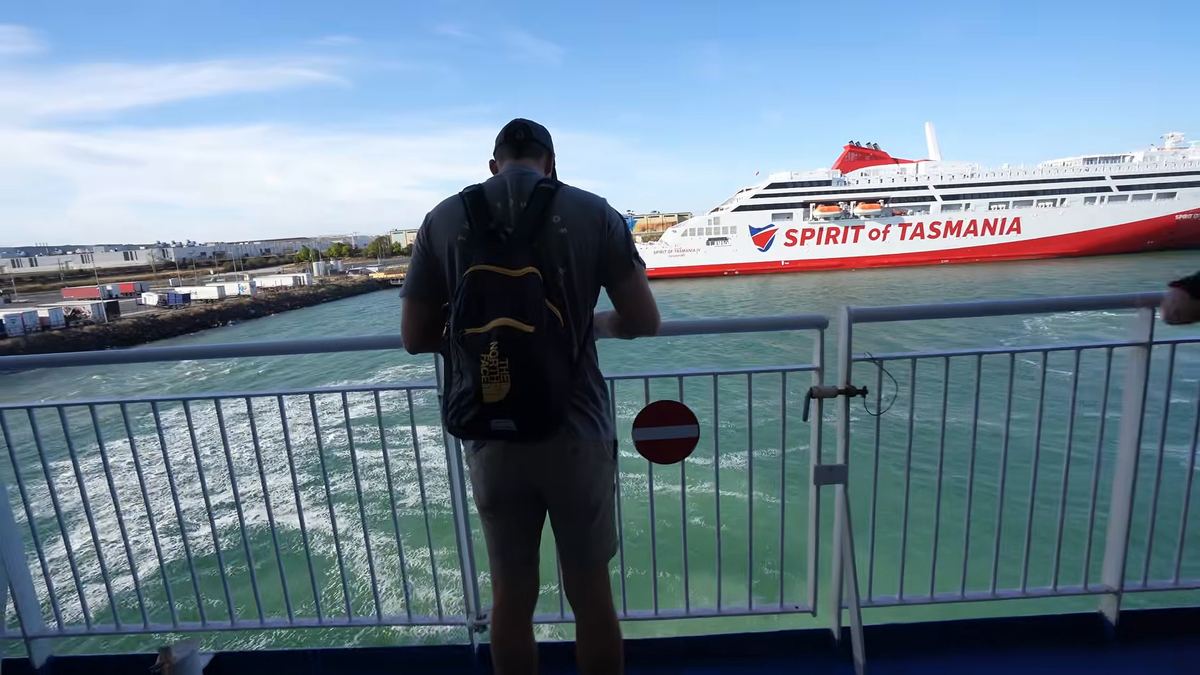 Luke on the open deck looking across at the other Spirit of Tasmania ship at Geelong